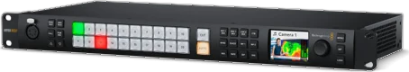 The ATEM 2 M/E Constellation 4K: a slim rack-mount switcher with a long row of source buttons and a small screen.
