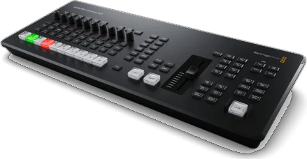 The ATEM Mini Extreme ISO G2: a wide desktop switcher with a row of audio faders, input buttons and a slide fader.